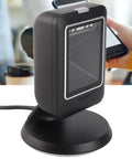 Omnidirectional 2D Barcode Scanner USB Wired Desktop Reader for Retail Stores and Supermarkets on counter scanning a smartphone