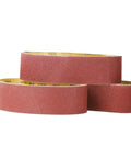 Five Piece Pack Of Top Shelf 915X100Mm Sanding Belts For Belt Sanders With Tough As Nails Abrasive Paper For Woodworking And Metal Jobs Delivering A Sweet Finish And Killer Grinding Power, close-up of three sanding belts.