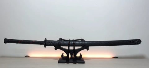 Solid Wood Sword Stand Display For Katana Wakizashi And Samurai Swords Black Finish Base Holder showcasing a sword on a desk