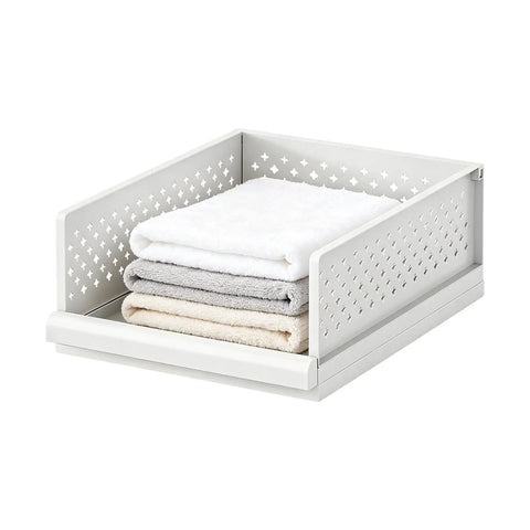 Stackable Closet Organizers Supercharge Your Home Storage Routine With Durable Wardrobe Bins Built For Seamless Bathroom Bedroom And Apartment Organization While You Kick Your Clutter Straight To The Curb. White polypropylene wardrobe bin with neatly folded towels.
