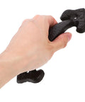 Hand holding Retro Style Cabinet Door Pull Handles 1 Set Sturdy Furniture Grips For Cabinets Closets And Dressers Vintage Design Easy To Open No Burrs For A Comfy Touch, showing textured black metal design.