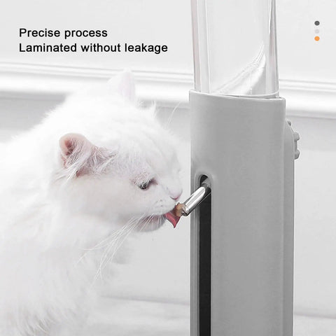 Height Adjustable 680 Ml Pet Water Dispenser And Automatic Food Feeder For Puppies Kittens And Rabbits Featuring Detachable Bowl Bite Resistant Design And Travel Sipping Fun For Your Fur Babies At Home Or On Road Trips with a cat using the roller nozzle.
