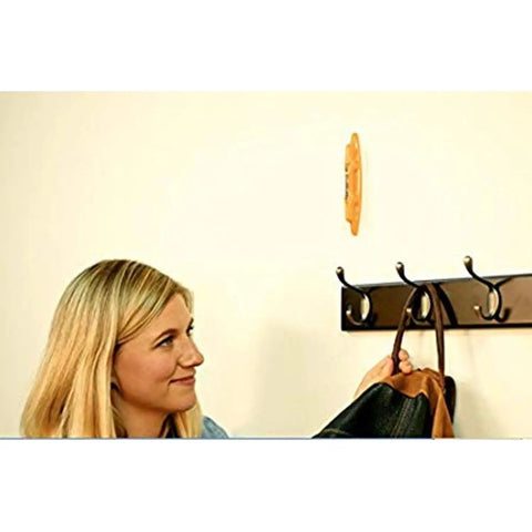 Woman using Magnetic Stud Finder Thats Easy To Use No Batteries Made In The USA Powerful Magnet Locates Drywall Studs Fast For DIY And Pros