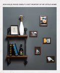 Hella Durable Industrial Pipe Wall Shelf Heavy Duty Two Tier Floating Bookshelf with books and vase on wooden shelves.