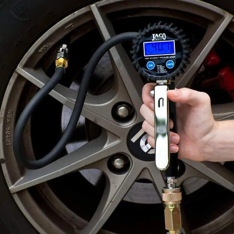 Person using FlowPro 2.0 Digital Tire Inflator With Pressure Gauge 200 PSI ANSI Grade 1A Accuracy Reads 0.10 PSI Increments on car tire