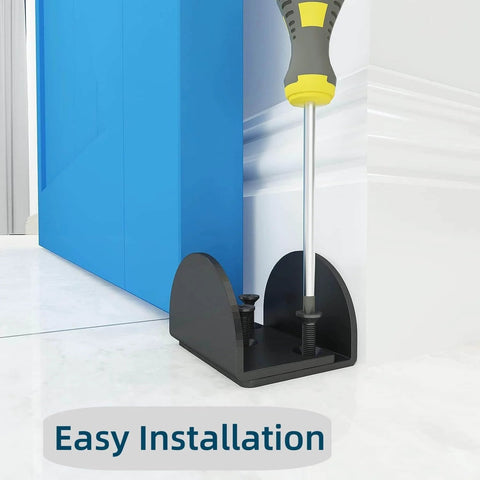 Sliding Barn Door Floor Guide U Shape Bottom Guide In Durable Matte Black Floor Mounted And Easy Install For Doors 1-7/16 To 1-13/16 Inches Thick Wide Arm Design Two Pack For Home Kitchen Bedroom Office, showing installation with screwdriver