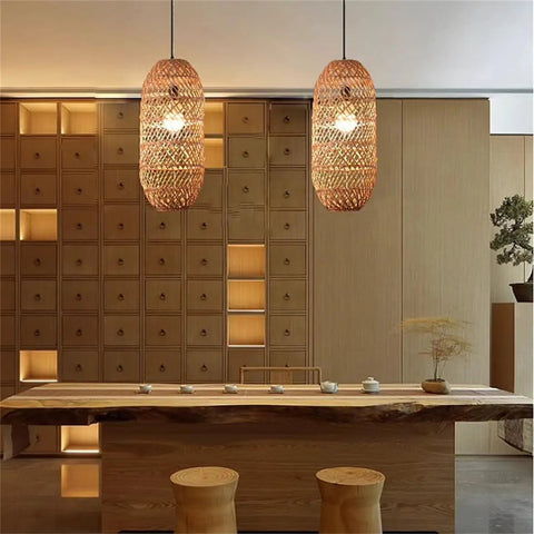 LQZCXMF Living Room Rattan Pendant Light 22.8" H Large Wicker Lamp Shade hanging over a wooden dining table in a modern kitchen.