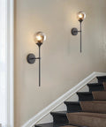 Sleek Smoke Grey Glass Globe Wall Sconce In Black Matte Finish With Slim Long Wall Mount Lamp Vintage Industrial Vibe For Hallway Stairs