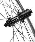 Close-up of Superteam hub on Dope Carbon Disc Brake Road Wheelset 700C Clincher Tubeless Ready U Shape Rim Deep Sections 38mm 50mm 60mm 88mm