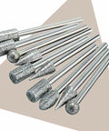 Stone carving diamond burr set with 1/8 in shank; front view shows assorted burr shapes for grinding and polishing.