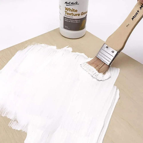 Brush applying Premium White Texture Gesso 250ml For Artists Pro Grade Primer For Acrylic, Oil, Pencils, Pastels, Graphite And Charcoal