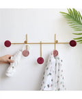 Slick Wall Mounted Coat Rack With Heavy Duty Adhesive Hooks And Key Holder For Mudroom Setup Easy Peel Design, holding clothes and umbrella.