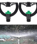 2 Pack 6 Nozzle Center Pivot Sprinkler System For Low Pressure Irrigation, black and green nozzles, spraying in garden.
