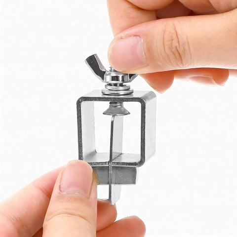 Hands holding 8 Pcs Butt Welding Clamps For Edge To Edge Welds, Auto Body Sheet Metal Clips, Small Welding Clamps Tack, metal tool close-up.