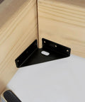 Heavy Duty Corner Brackets 24 Pack With 144 Screws, Metal Gusset Joints in black installed on wooden corner.