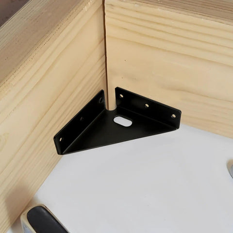 Heavy Duty Corner Brackets 24 Pack With 144 Screws, Metal Gusset Joints in black installed on wooden corner.