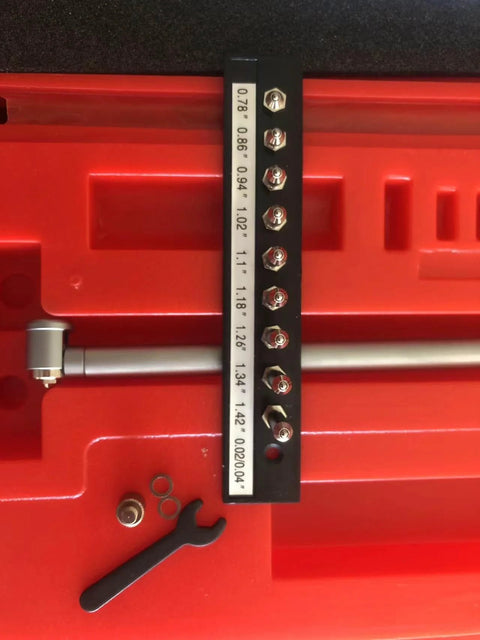 LLDSIMEX dial bore gauge set on a black mounting rack; 0.7-1.5 in range, 0.0005 in graduation.