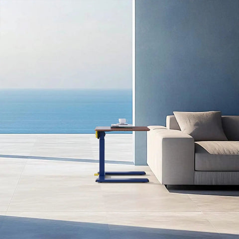 Rolling End Table From 100 Percent Solid Wood With Height Adjustable 19.8 To 29.7 Inches next to a modern sofa by the ocean view