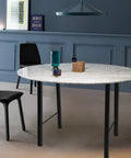 Round marble table with Two 28 Inch Industrial Trapezoid Table Legs Heavy Duty Metal Desk Support Black Powder Coated.