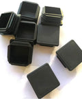 8 Pack 1 1/2 Inch Square Black Plastic End Caps For Square Tubing And Furniture Finishing Plugs shown stacked