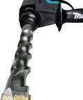 Close-up of Makita SDS-Plus 3/4-inch concrete drill bit attached to hammer drill
