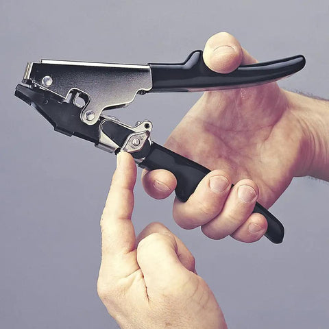 Person holding HVAC Flex Duct Cable Tie Tensioning Tool with Auto Cut Off, showing adjustable tension knob and steel construction.