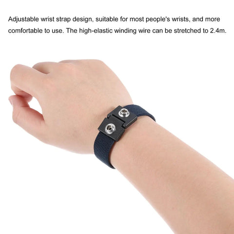 Person wearing Three Pack Antistatic Wrist Straps Set for ESD Protection, showing adjustable strap on wrist, dual circuit design.