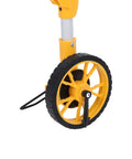 Close-up of the Keenso Digital Display Measuring Wheel Accurate Professional Distance wheel with a yellow and black design.