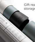 Pebble Black Leather Desk Mat With Cable Organizer 35 By 17 Inches rolled in a storage tube