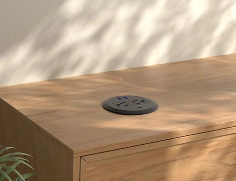 Pretty Slick 3 Inch Desktop Power Grommet 2 Pack With Pd 20W Usb C Fast Charger And 6.5 Foot Cord Black flush mount on wooden desk.