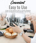 Person holding Two Pack Ultra Realistic Car Key Safe Diversion Key Fobs With Hidden Secret Compartments at a dining table