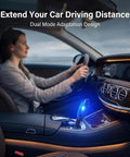 Driver using a car with Fuel Sync Gas Saver Plug In Device For Cars And Trucks, Instant Savings And More Miles, glowing in console.