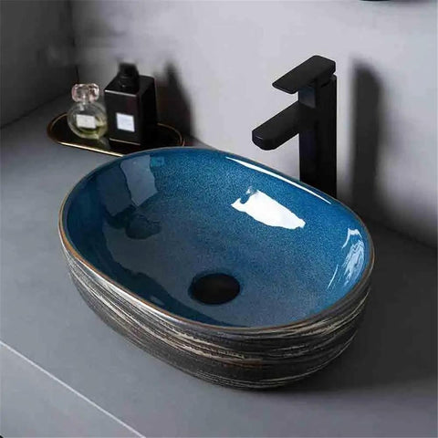 UYTROPLK Bathroom Vessel Sink Small Oval Ceramic Outdoor Indoor Bathroom Vintage Pedestal Basin with Accessories showing glossy blue finish.