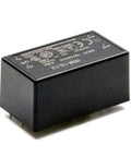 Kickass Ultra Compact 12V AC DC Converter Switching Power Supply Super Tight Pcb Mount Module with black casing and label.