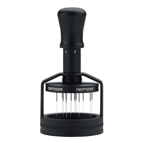 Top Shelf 58mm Espresso WDT Tool Featuring 16 Concentric Needles And Rock Solid Magnetic Base For Hella Even Puck Distribution Adjustable Depth Coffee Needle Stirrer Totally Nailing Shots Daily, black handheld espresso tool with adjustable depth.