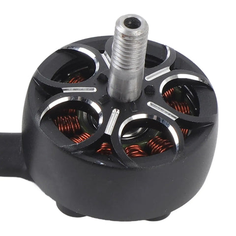 Close-up of Hard Hitting S2207 Brushless FPV Motor For 5 Inch Drones, Ultra Efficient 1850KV On 4 To 6S showing copper coils.
