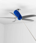 Grab And Go Cobweb Duster With Extension Pole Kit Washable Duster cleaning a ceiling fan using aluminum telescoping rod in blue.
