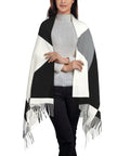 Black And White Piano Grid Long Scarf With Casual Fringe Edge Mega Comfy Winter Shawl Wrap worn by a woman, 77.6 x 28.3 inches.