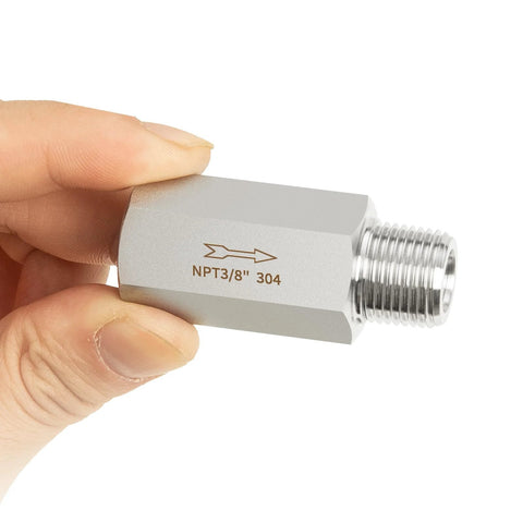 Close-up of inline Siamese check valve, 3/8" NPT male x 3/8" NPT female, 304 stainless steel, held in hand