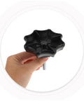 Spare Tire Bolt Adapter And Retainer Clamp for Secure Mounting, black plastic knob held in hand, versatile fit for many car models.
