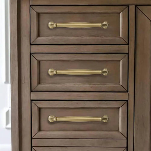 Top Shelf Brushed Brass Cabinet Pulls 10 Pack 5 Inch Center To Center heavy duty handles on wooden dresser drawers.
