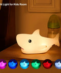 Rechargeable Cute Squishy Shark Night Light For Kids And Teens Soft Silicone Touch Lamp With Gentle Glow on bedside table
