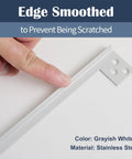 Edge smoothed grayish white heavy duty stainless steel door latch shield plate anti pry guard for outswing residential entries.