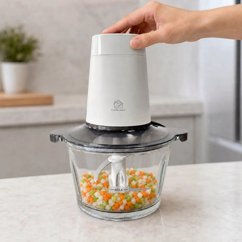 Cuisine Talent Electric Food Chopper With 1.8L Glass Bowl 150W Motor in use chopping mixed veggies.