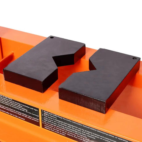 Badass 30 Ton Air Hydraulic Shop Press With Gauge And Air Pump, Heavy Duty H Frame, black support blocks on orange surface.