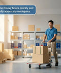 Person using a 24X36 Aluminum Platform Truck Cart, 660 Lb Heavy Duty Workhorse Flatbed for moving boxes in a workspace.