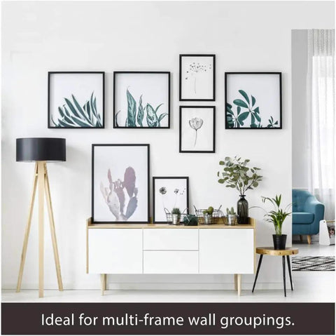 Gallery wall with Heavy Duty Picture Hangers Kit For Wood Frames And Canvases On Drywall, six framed plant prints displayed.