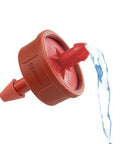 Pressure Compensating Drip Irrigation Emitters 4 GPH Self Cleaning Constant Flow Heads in action with water flow