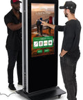 Heavy Duty 43 Inch Dual Sided Touchscreen Kiosk featuring interactive display used by two men in retail setting.