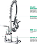 Robust Wall Mount Kitchen Sink Faucet With A Slick Polished Chrome Surface And High Pressure Pre Rinse Sprayer, showing 360° rotation feature.